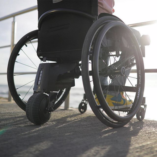 Alber Smoov One Power Assist on wheelchair